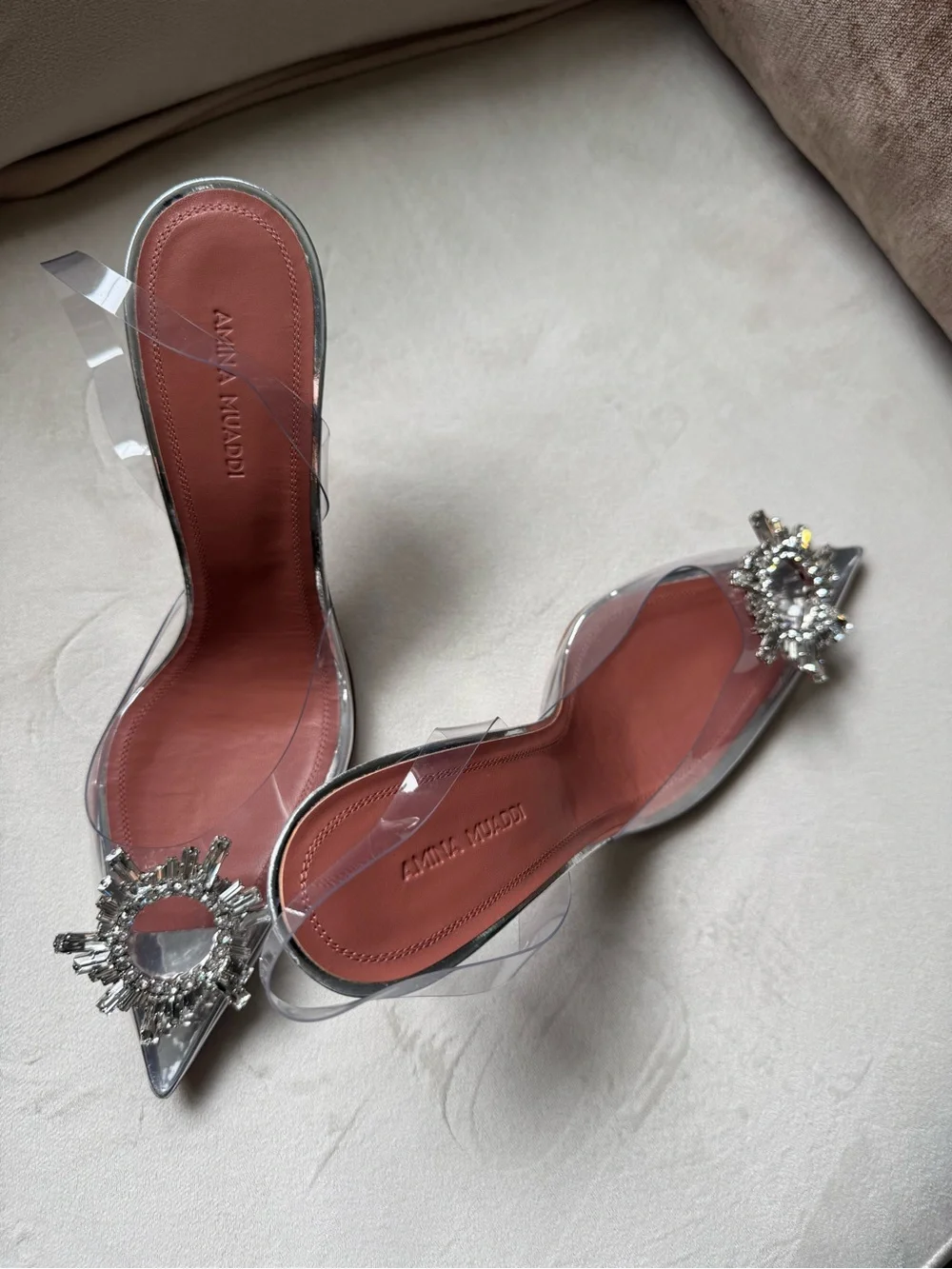 Amina Muaddi Clear PVC Pointed Mule Heels with Silver Crystal Brooch